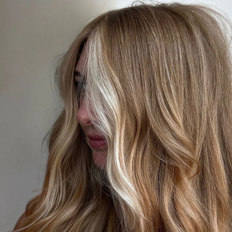 Honey blonde with a bright face framing money piece at Dubé New York, New York NY