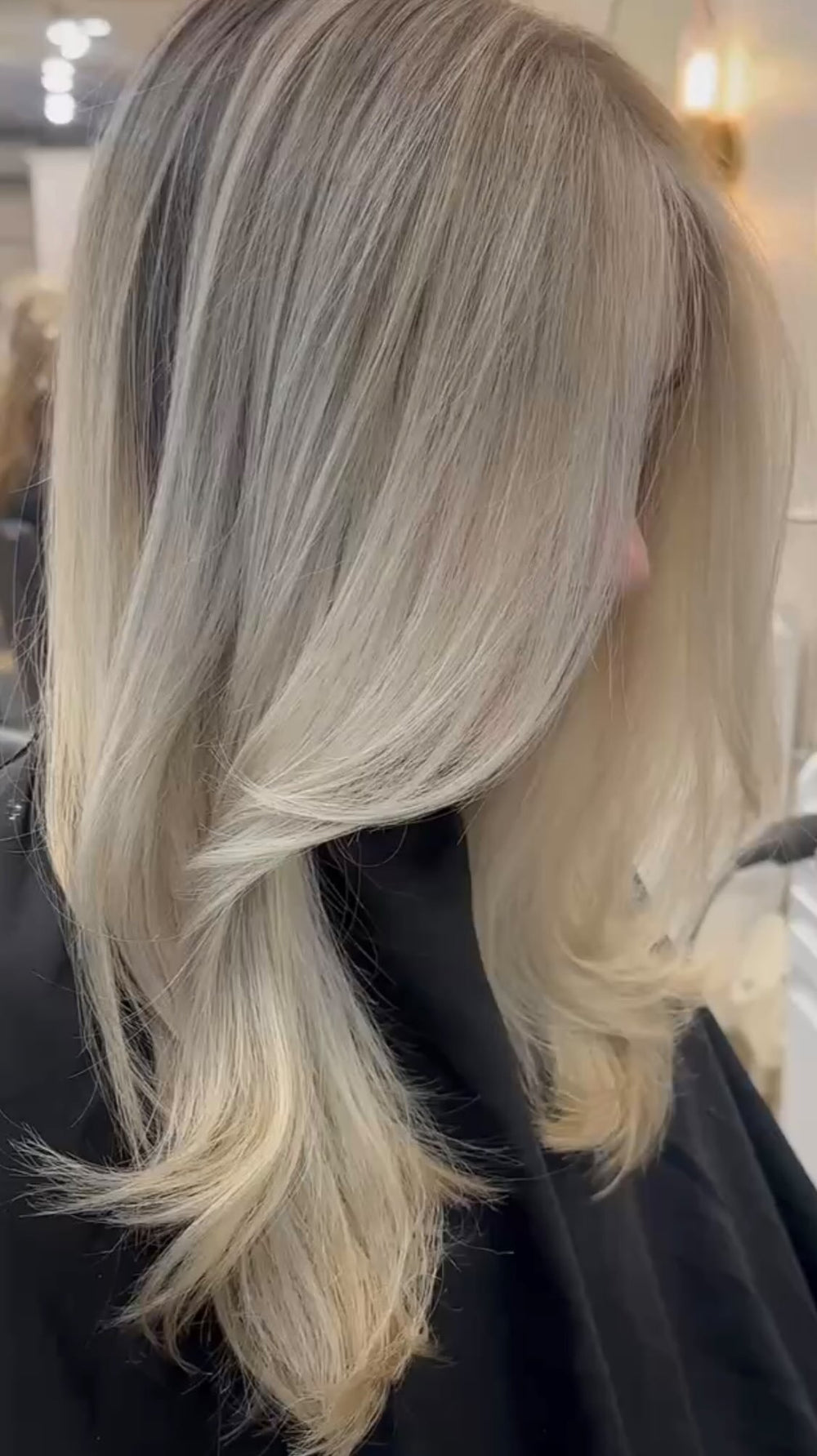 Bright blonde balayage with long layers at Dubé New York, New York NY
